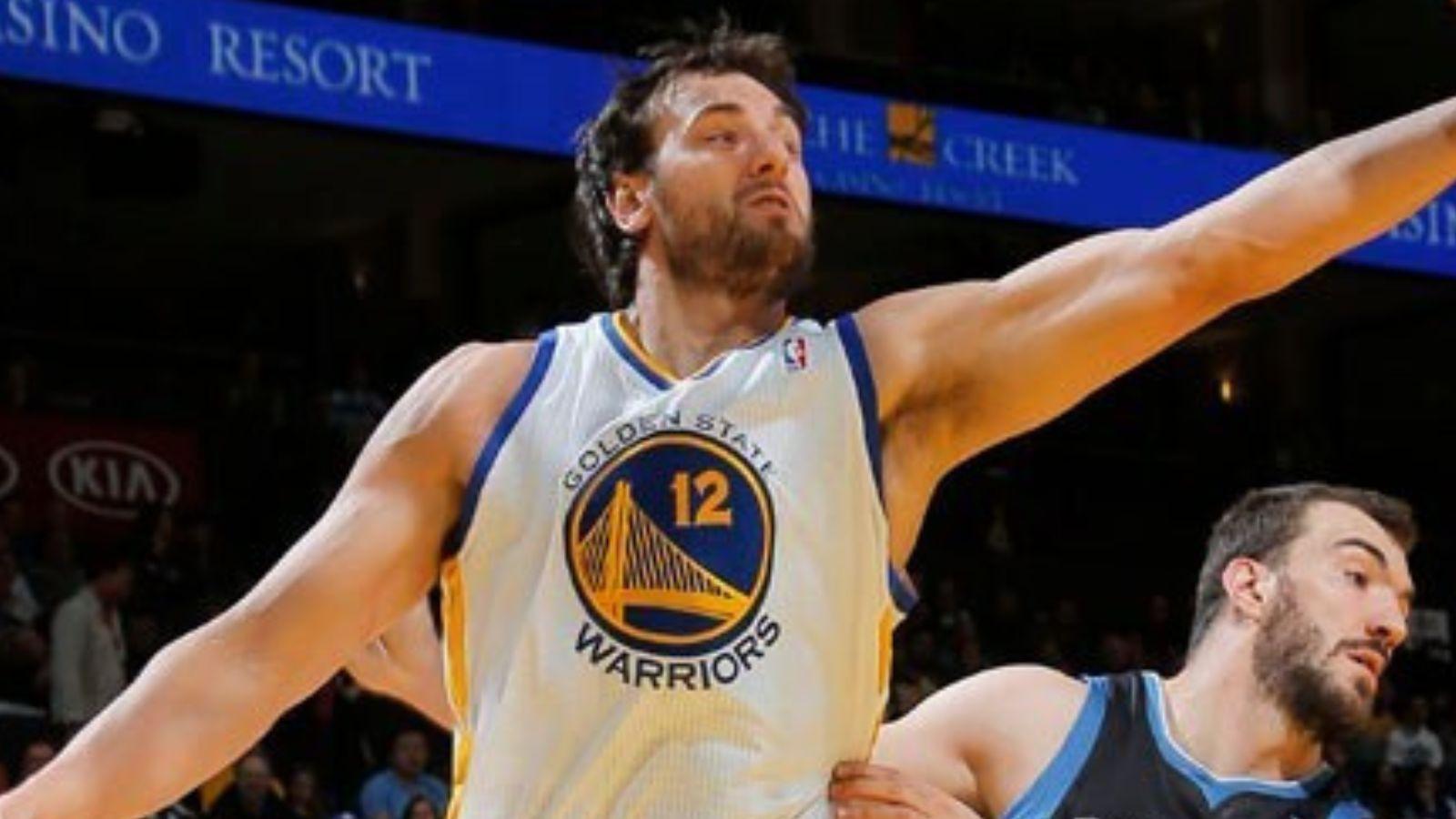 Andrew Bogut controlling the basketball during his stint with the Golden State Warriors.