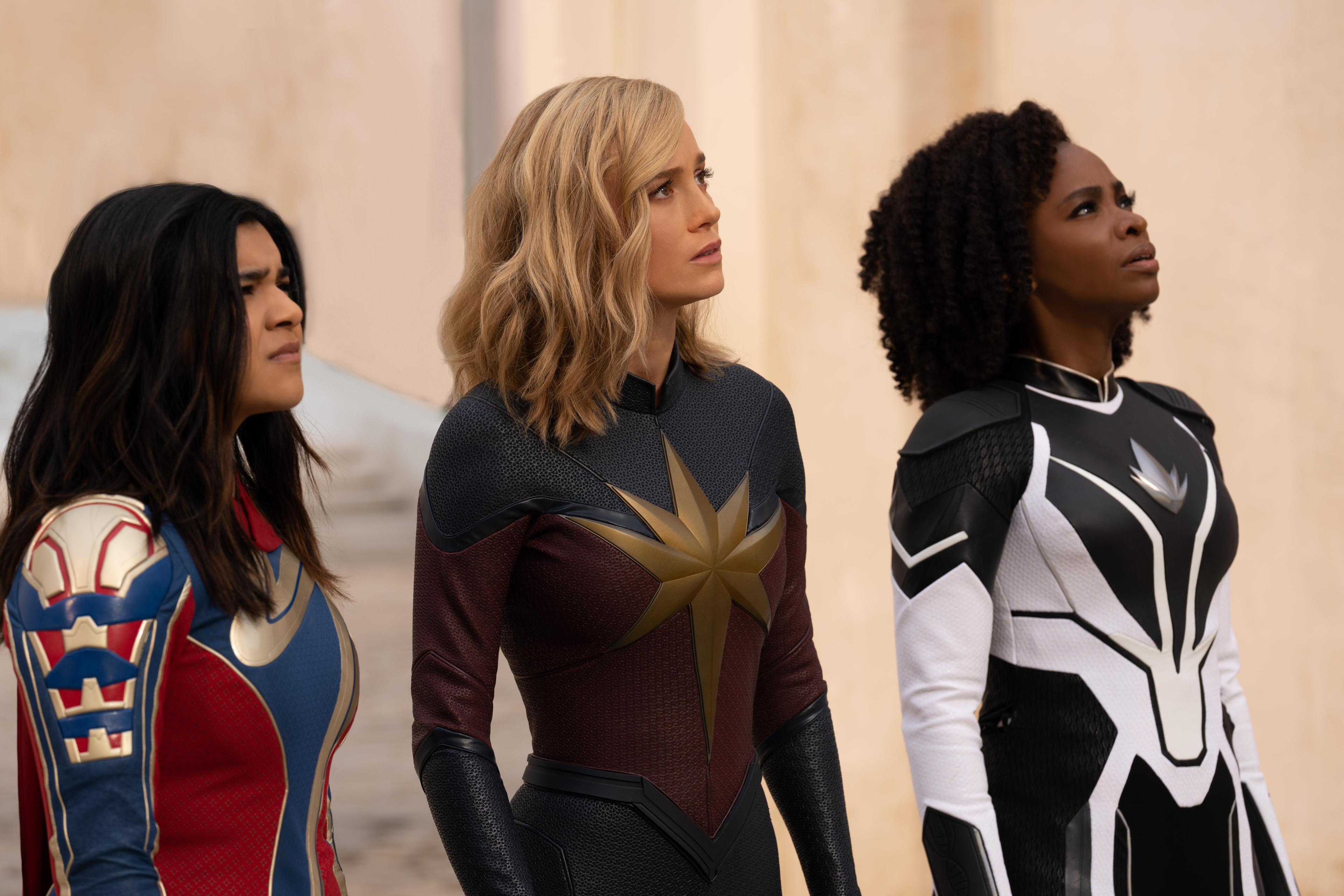 Brie Larson as Captain Marvel, Iman Vellani as Ms MArvel, and Teyonah Parris as Monica Rambaeu in The Marvels