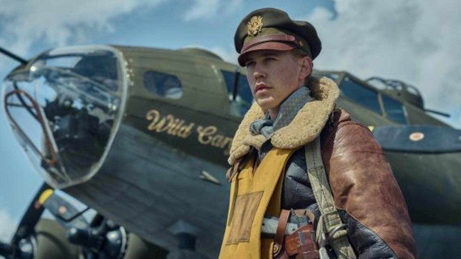 Austin Butler as Buck, standing in front of a plane in Masters of the Air.