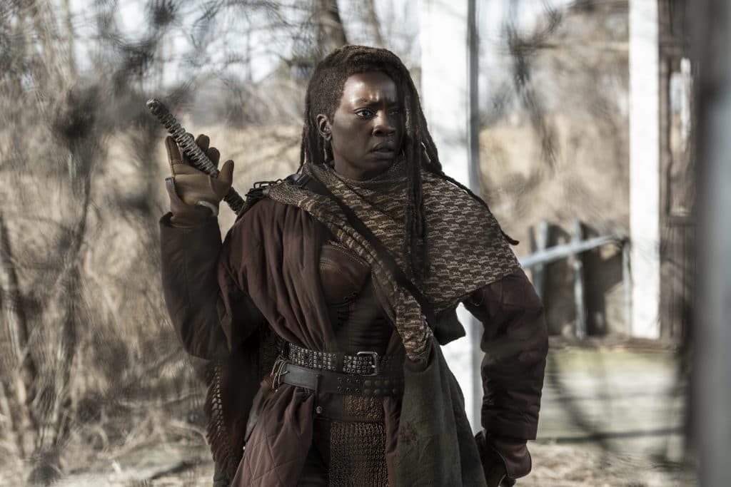 Danai Gurira as Michonne in The Walking Dead: The Ones Who Live standing in the woods