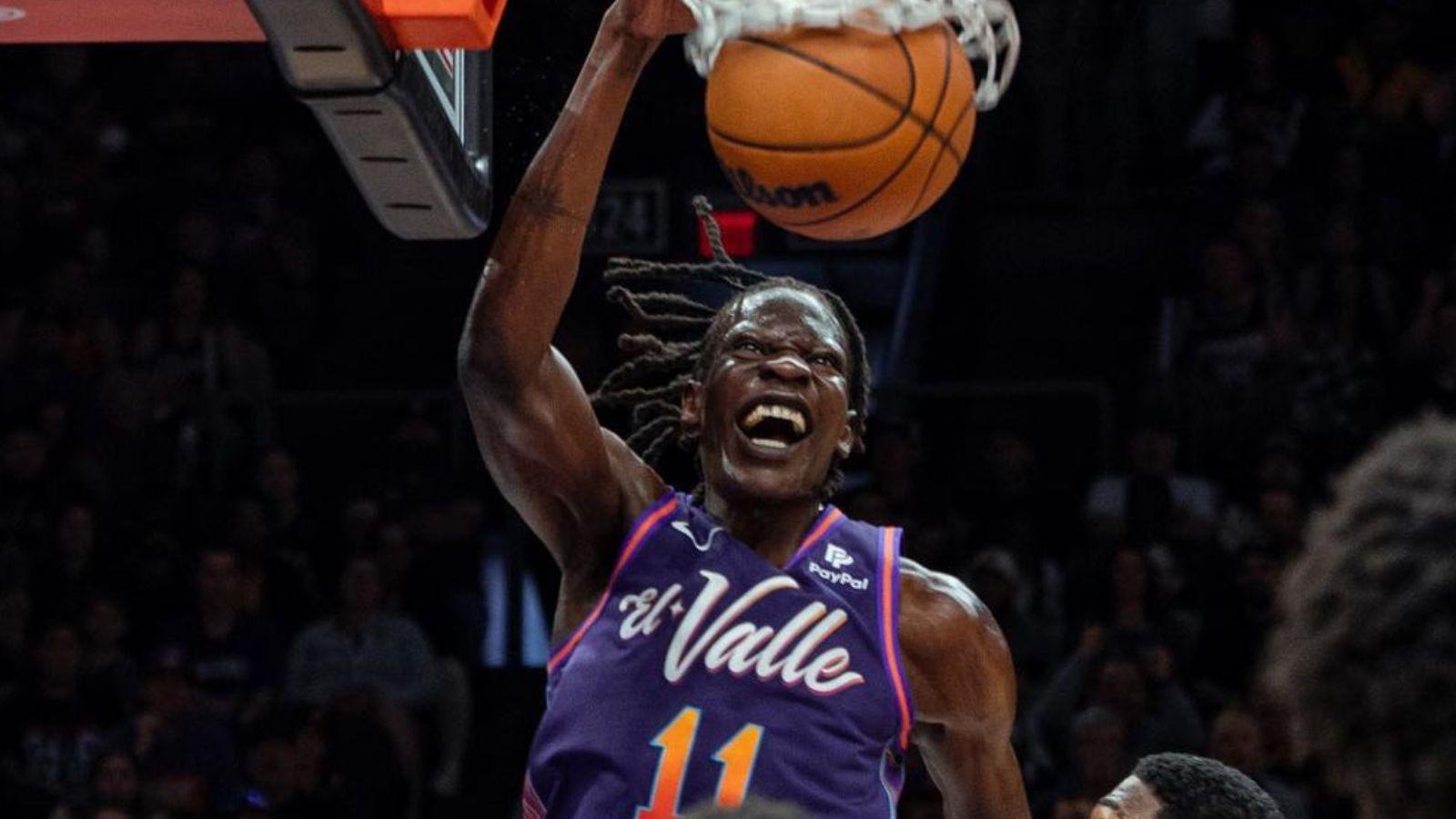 Bol Bol dunking as a member of the Phoenix Suns.