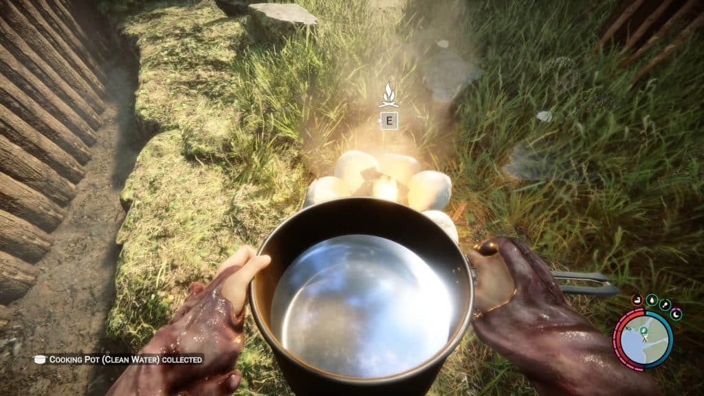 Using the cooking pot in Sons of the Forest.