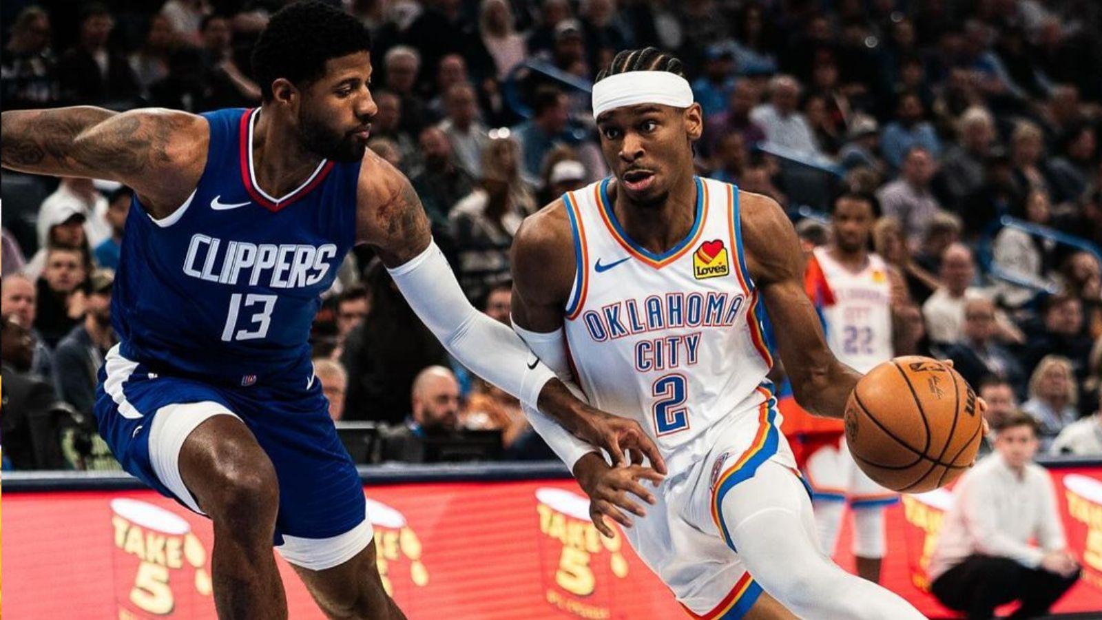 Shai Gilgeous-Alexander driving to the basket as a member of the Oklahoma City Thunder.