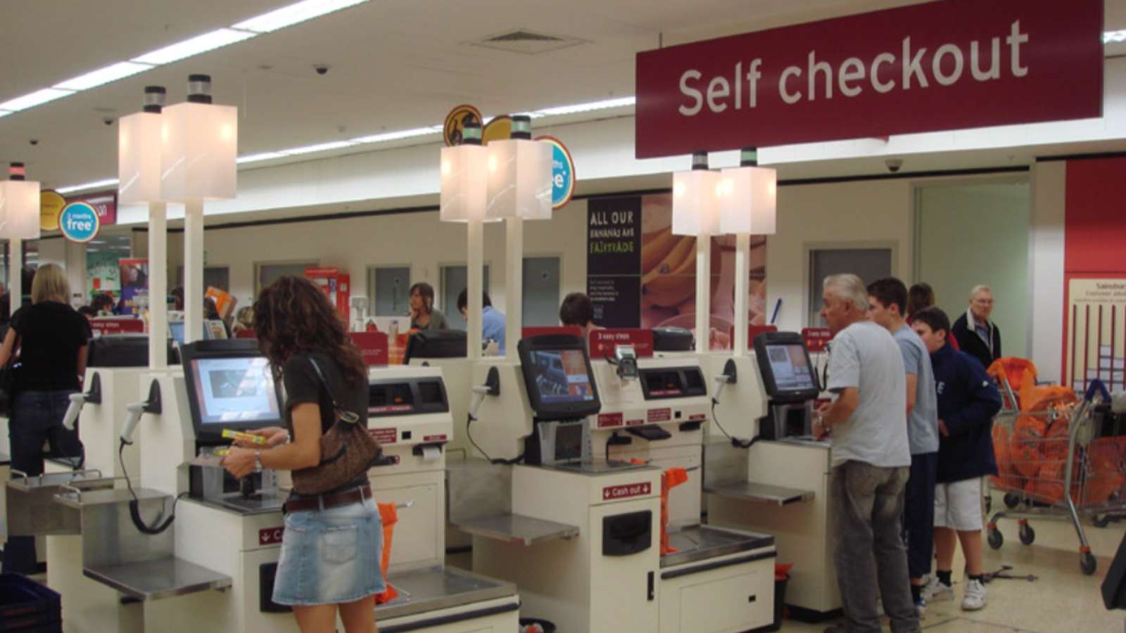 People at self checkout