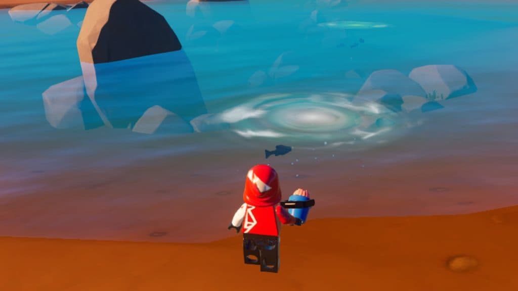 A screenshot featuring a Bait Bucket being used in LEGO Fortnite.