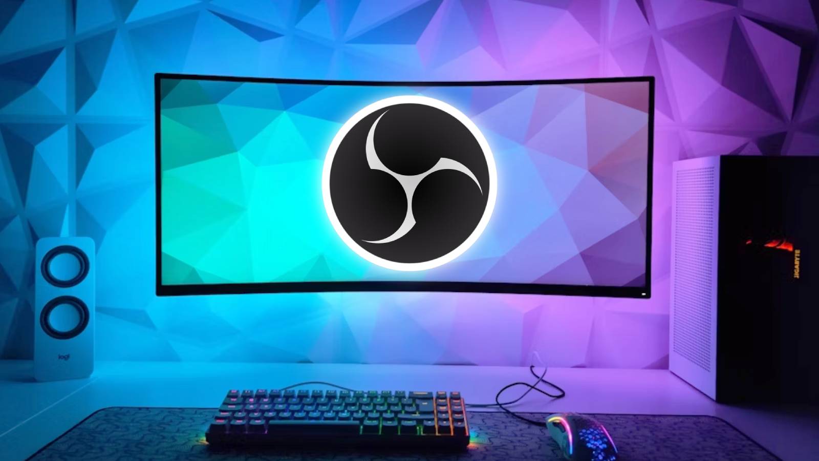 Image of a gaming PC taken from Unsplash, feauturing the OBS logo on the screen.