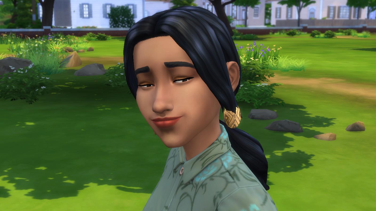 A screenshot featuring a Sim wearing a earrings from The Sims 4 Crystal Creations.