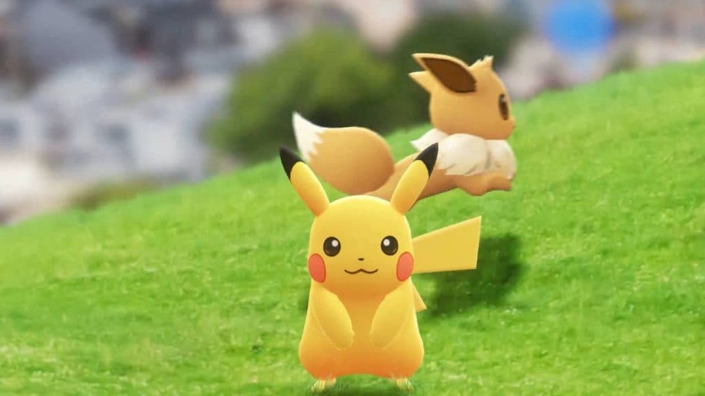 Pikachu stands on a green hill