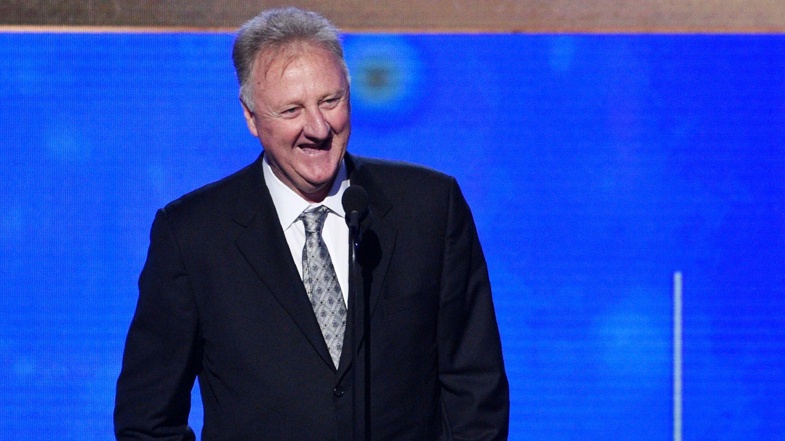 Larry Bird on stage at an award show.