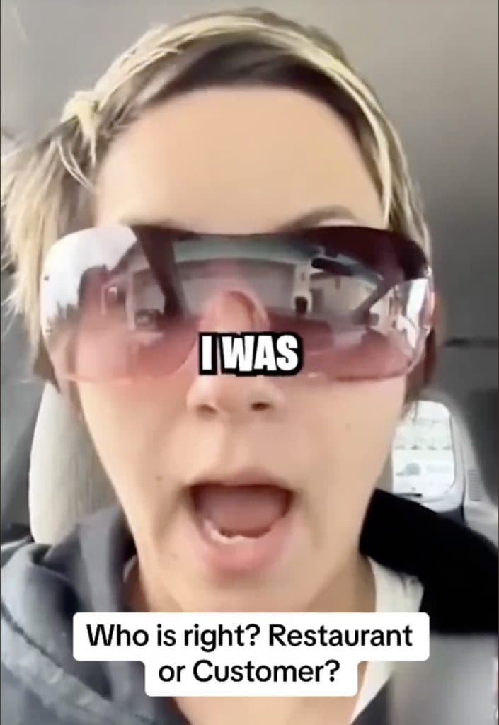 A photo of a woman in sunglasses making a TikTok