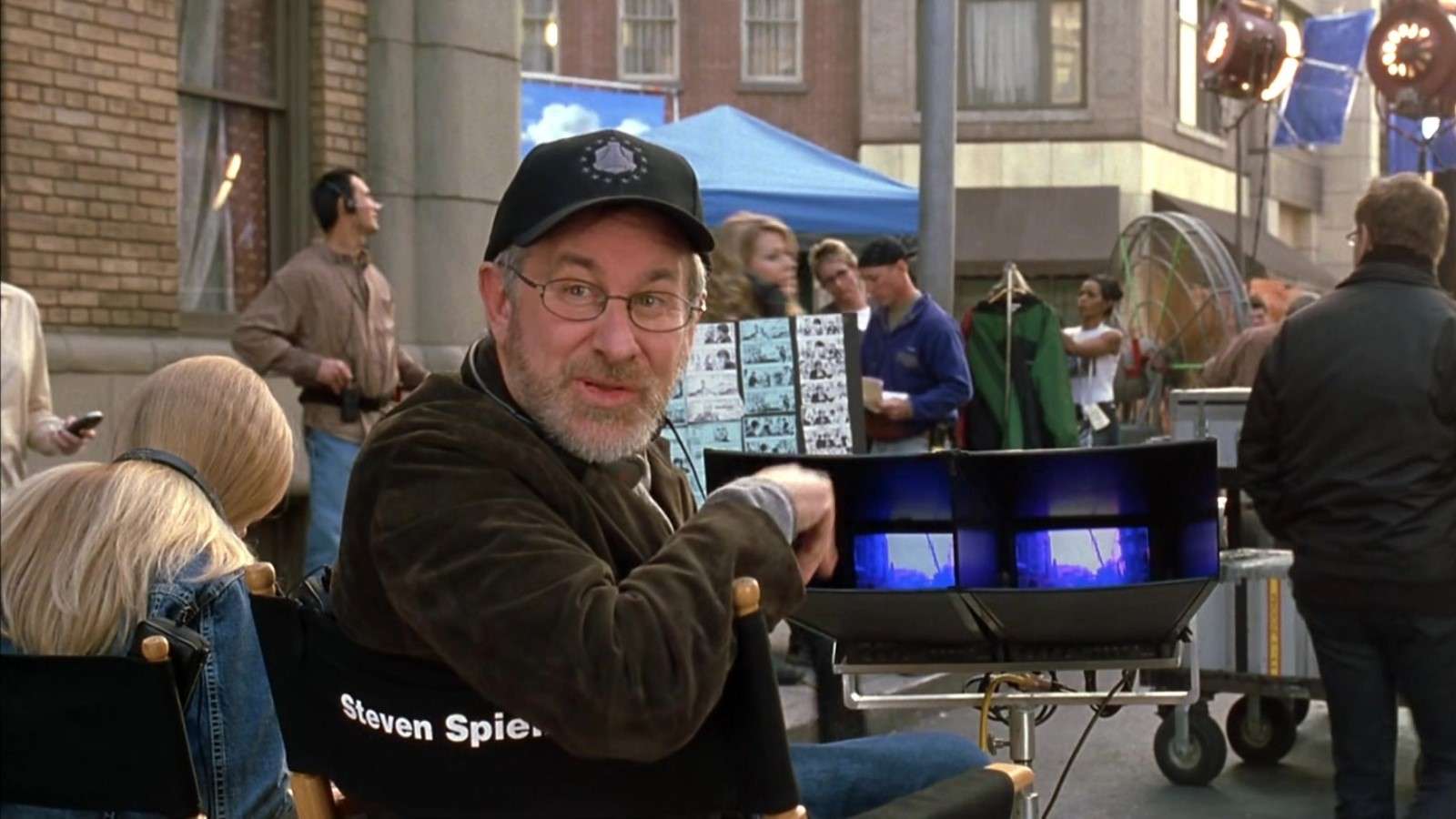 Steven Spielberg sitting in a director's chair