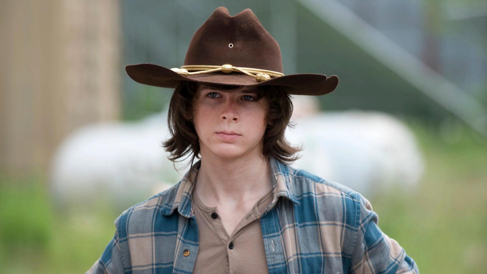 Chandler Riggs as Carl in The Walking Dead