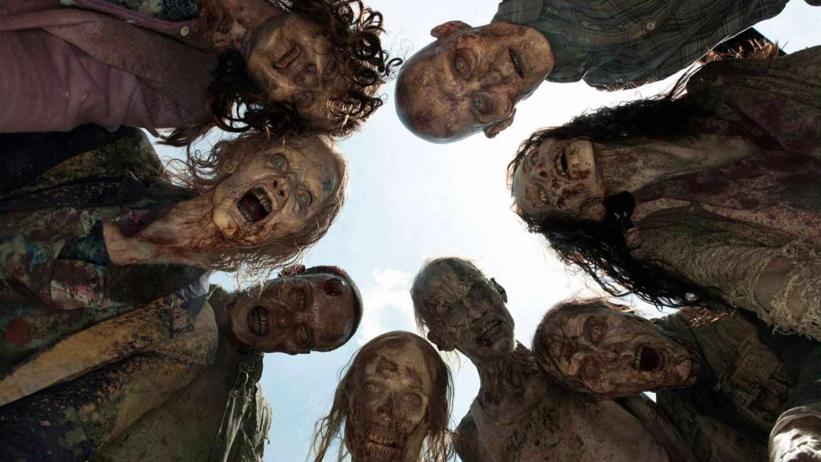 The Walking Dead: A group of Walkers surround the camera in a circle