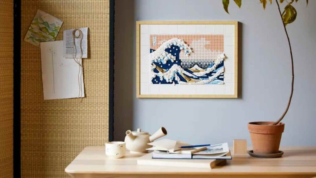 The LEGO Art Hokusai – The Great Wave on display against a wall