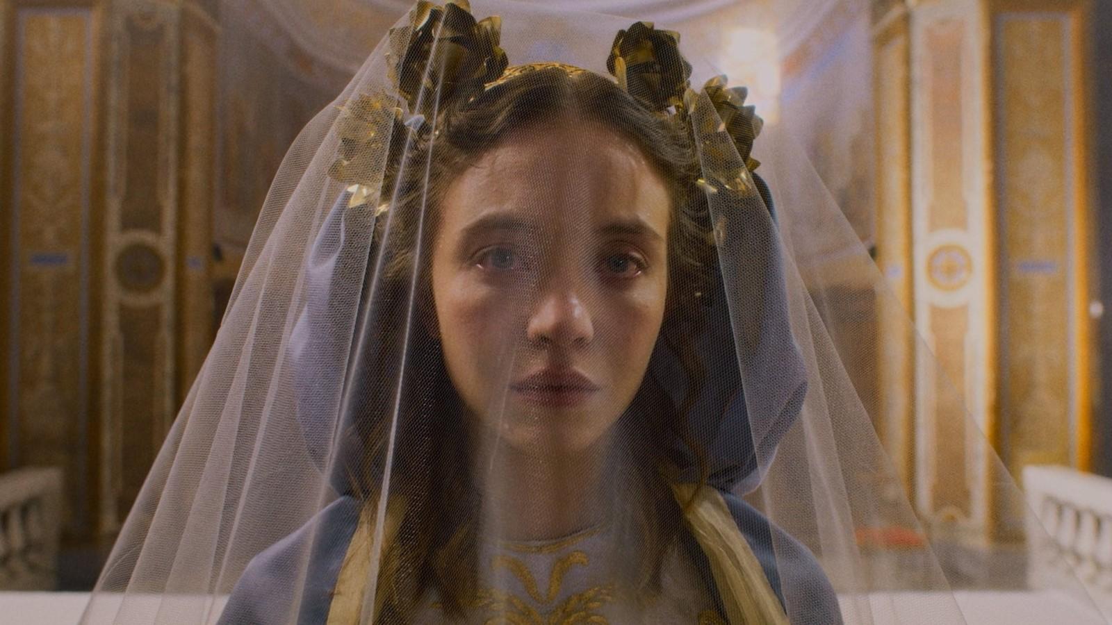 Sydney Sweeney as Sister Cecilia in Immaculate, dressed as the Virgin Mary