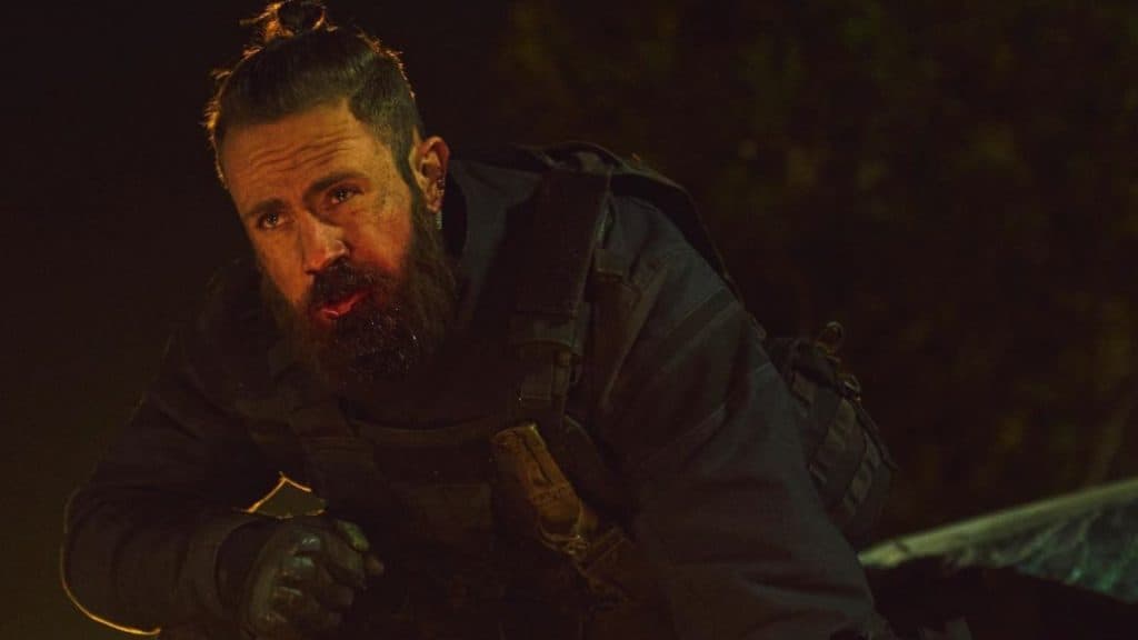 Justin Harvey in The Witch: Part 2 as a mercenary.