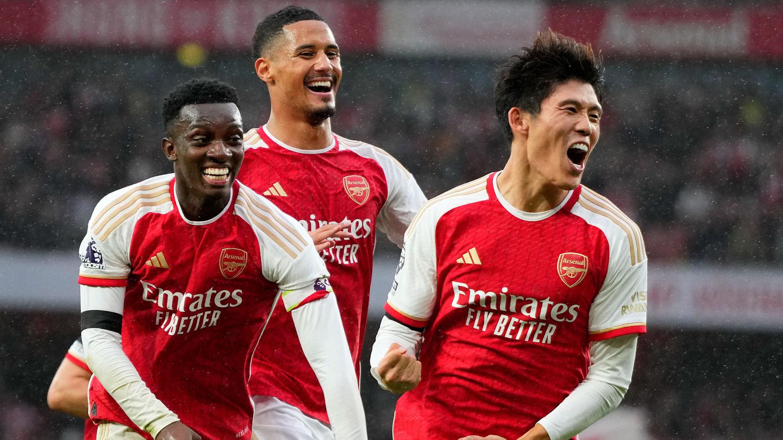 Nketiah, Tomiyasu, and Saliba celebrate for Arsenal
