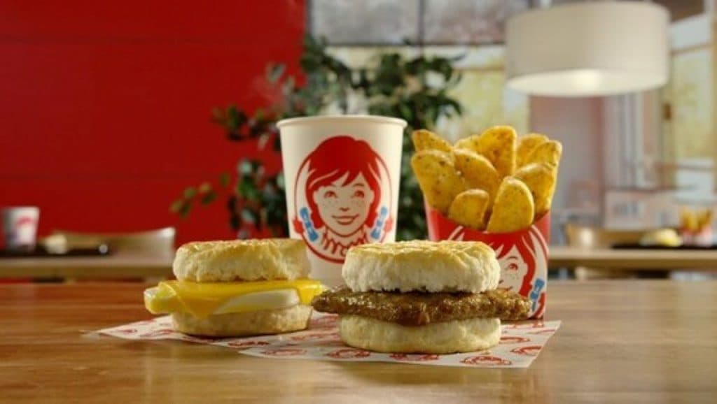 Wendy's breakfast with biscuits, drinks and potatoes