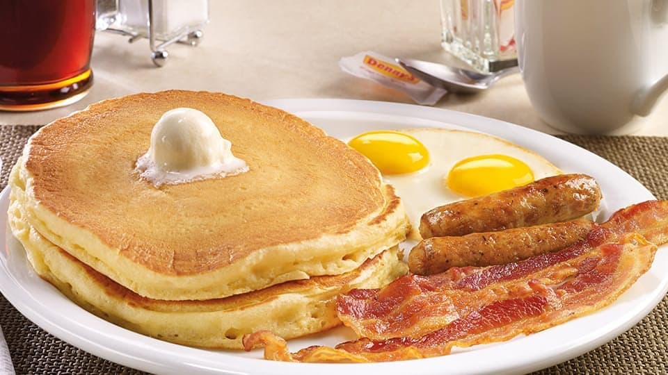Denny's pancakes, eggs, bacon and sausages