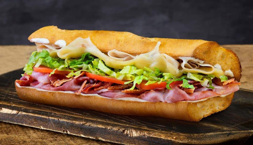 A quizno's footlong sub sandwich