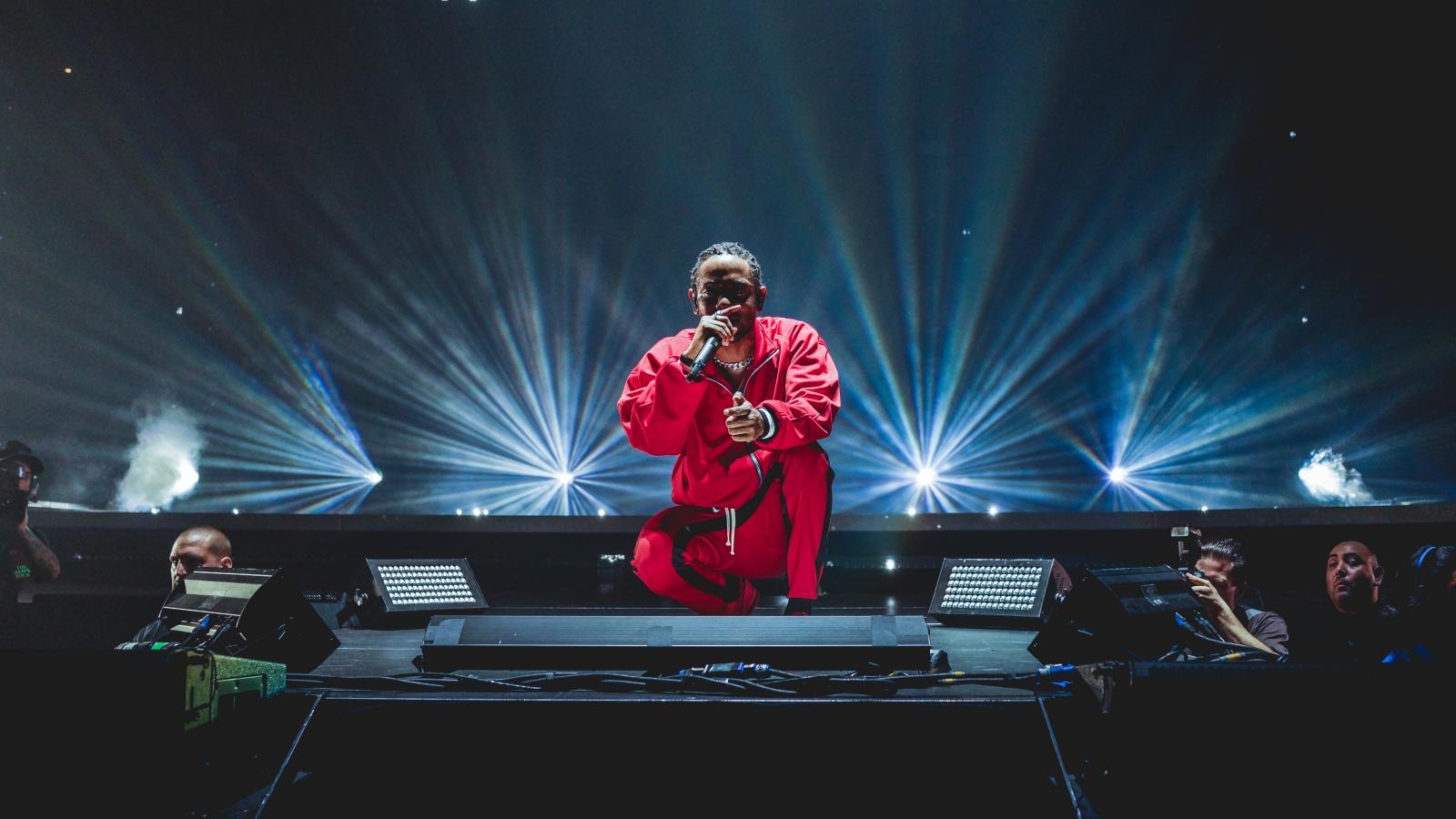 Kendrick Lamar performing on tour in 2017