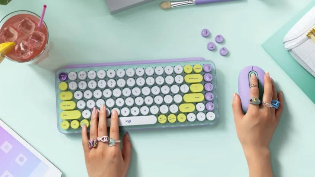 Image of the Daydream Mint Logitech POP Keys keyboard on a desk.