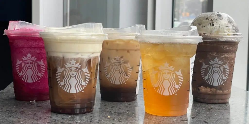 A photo of several starbucks iced coffees