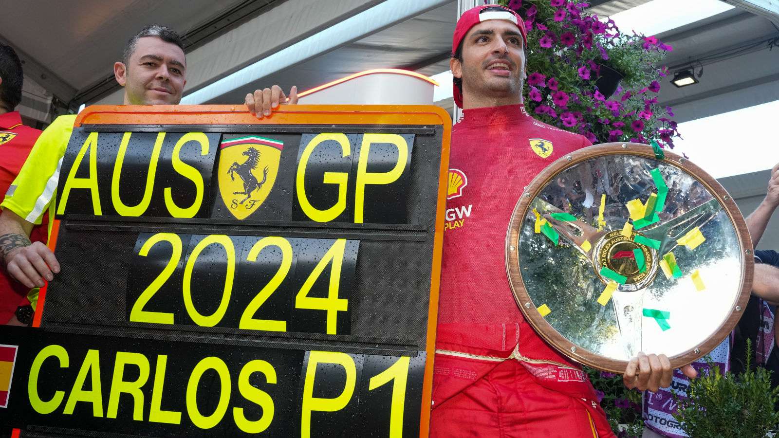 Carlos Sainz celebrates winning the Australian Grand Prix