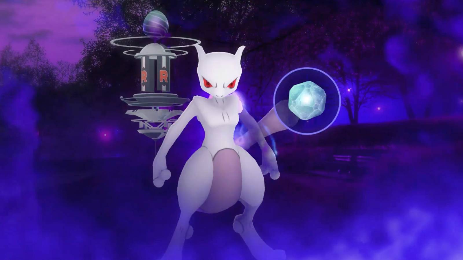 The Pokemon Mewtwo appears floating in the air, alongside a Pokemon Go purified gem