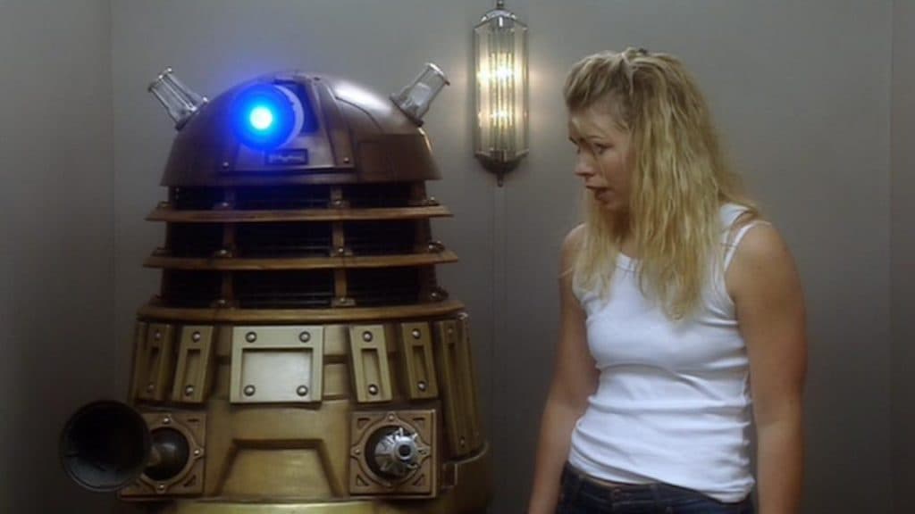 Rose rides in an elevator with a Dalek.