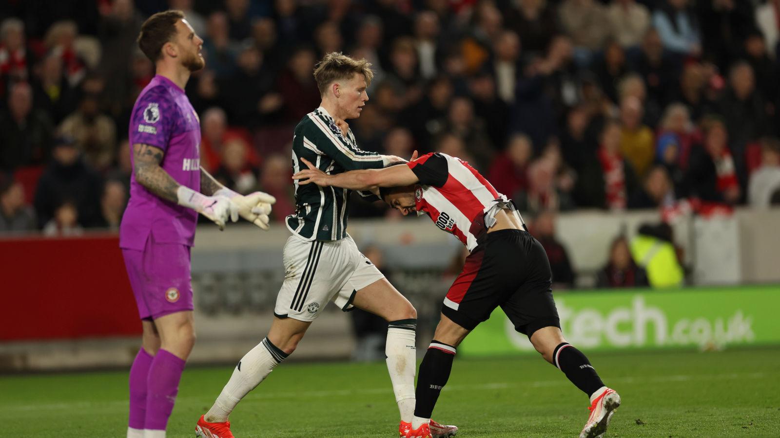 Brentford forward Neal Maupay (R) and Scott McTominay (L) clash