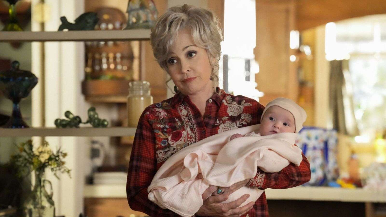 Meemaw holding Cece in Young Sheldon