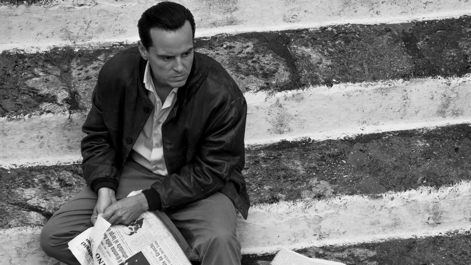 Andrew Scott reading a newspaper in Ripley.