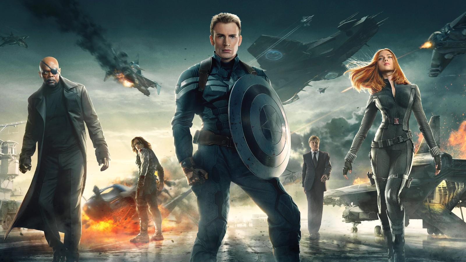Captain America flanked by Nick Fury and Black Widow in Captain America: The Winter Soldier.