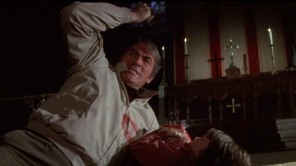 Father killing son on an altar in The Omen.