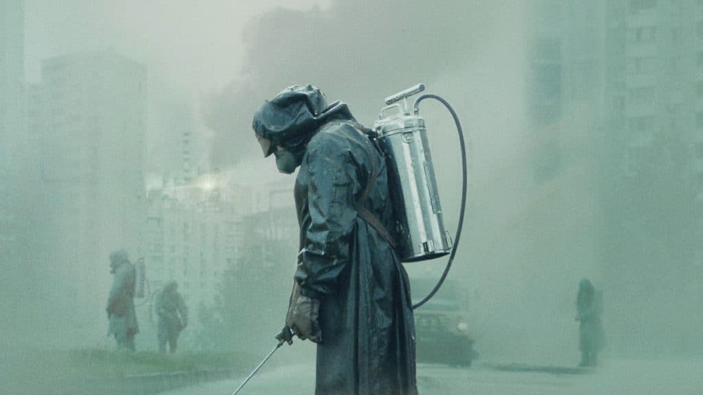 Shows to watch if you like Fallout: A man in a hazmat suit stands in Chernobyl