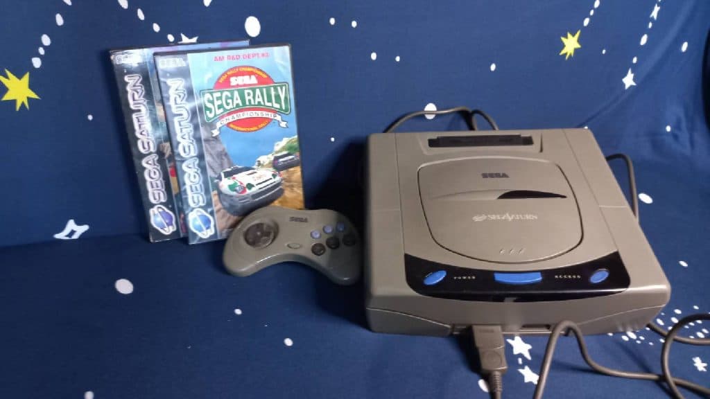 SEGA Saturn with two games