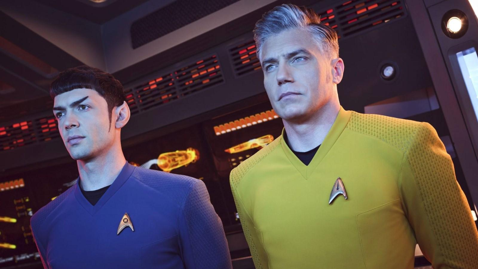 Anson Mount and Ethan Peck as Captain Pike and Spock on the bridge in Star Trek: Strange New Worlds