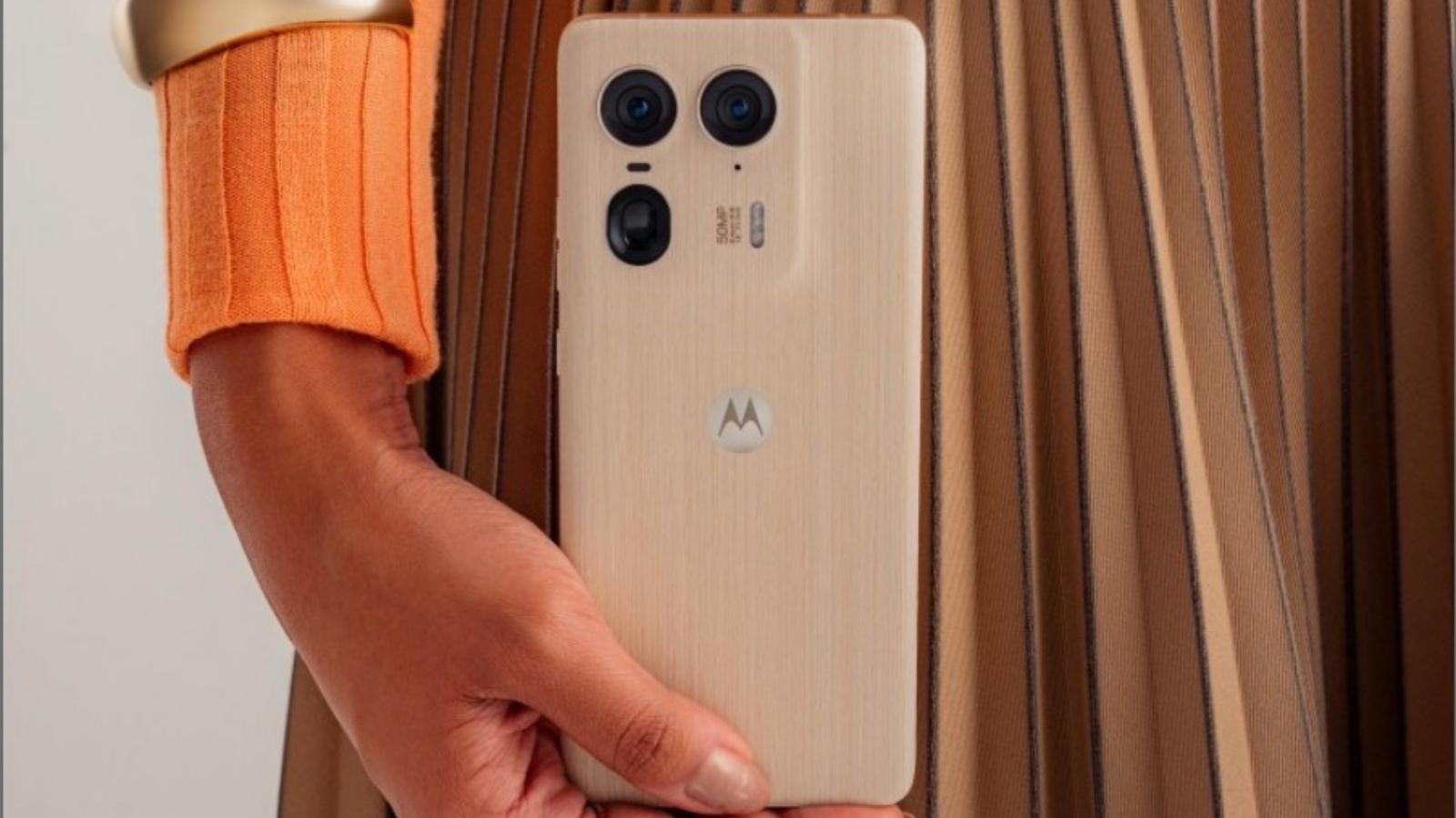 Motorola Edge 50 Ultra with a wooden back