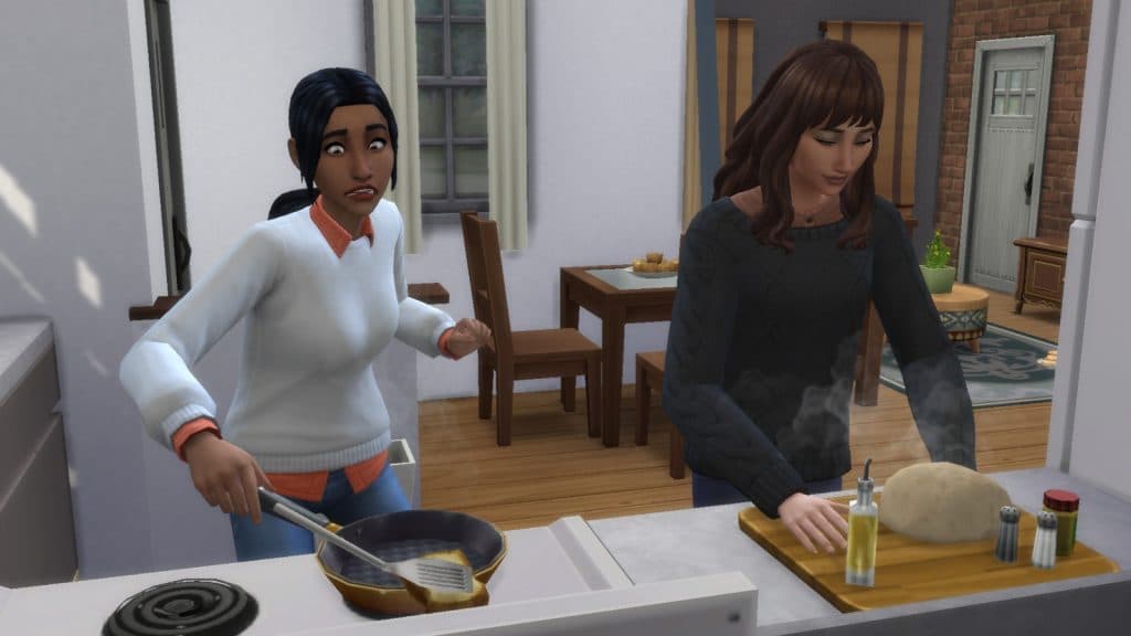 A screenshot featuring Sims cooking in a group in The Sims 4.