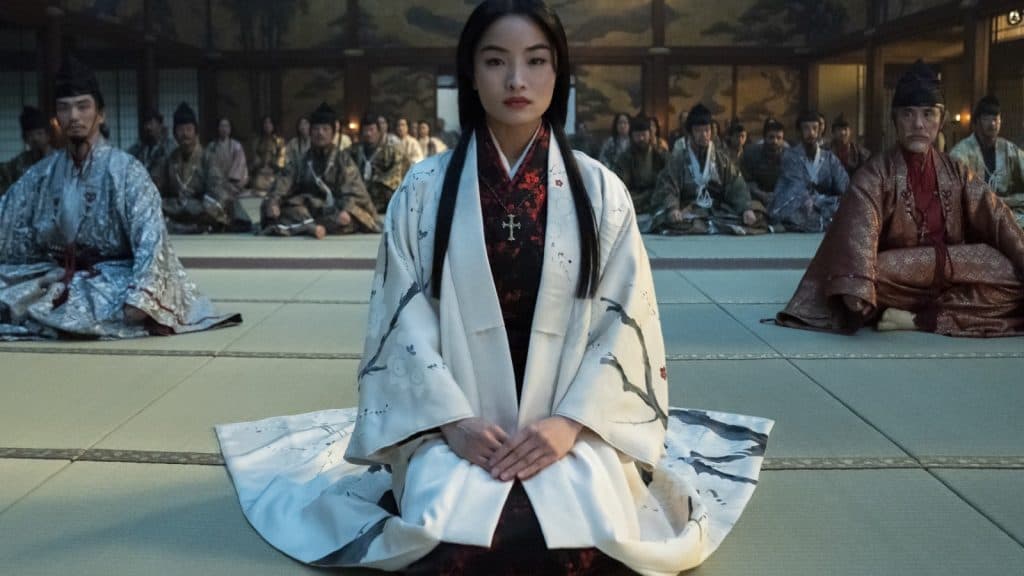 Anna Sawai, kneeling, as Lady Mariko in Shogun.