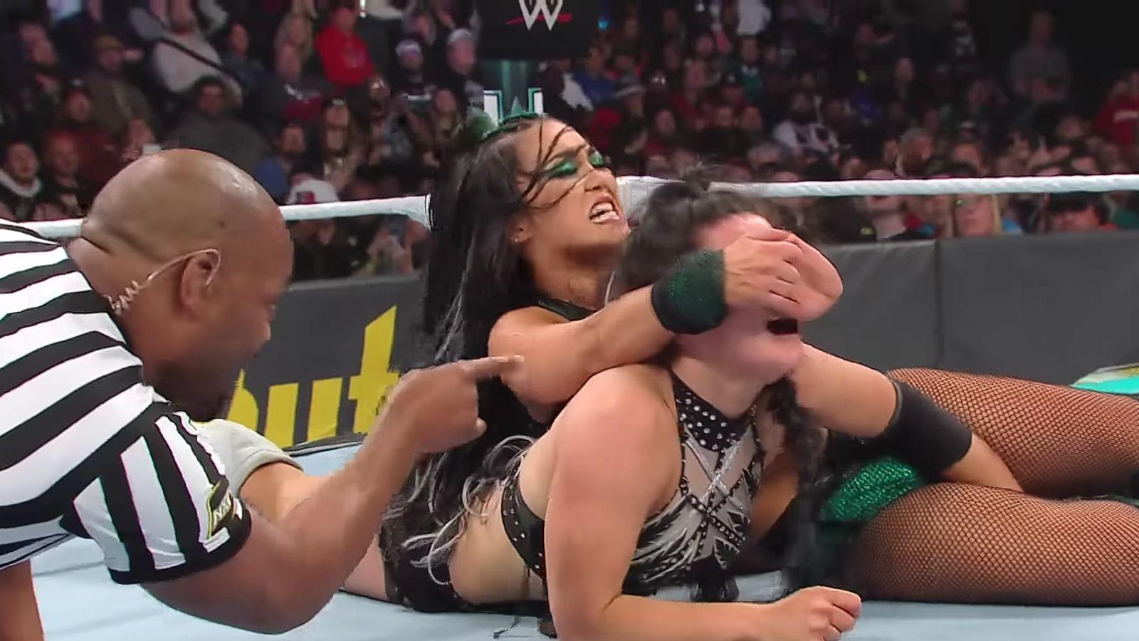 Roxanne Perez performing a submission move on Lyra Valkyria at WWE NXT Stand & Deliver on April 6, 2024.