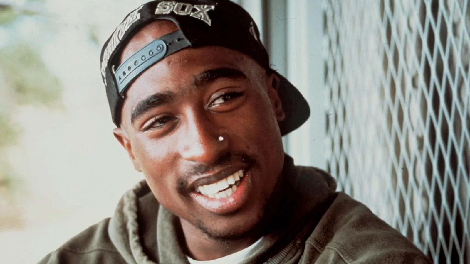 tupac smiling into the camera