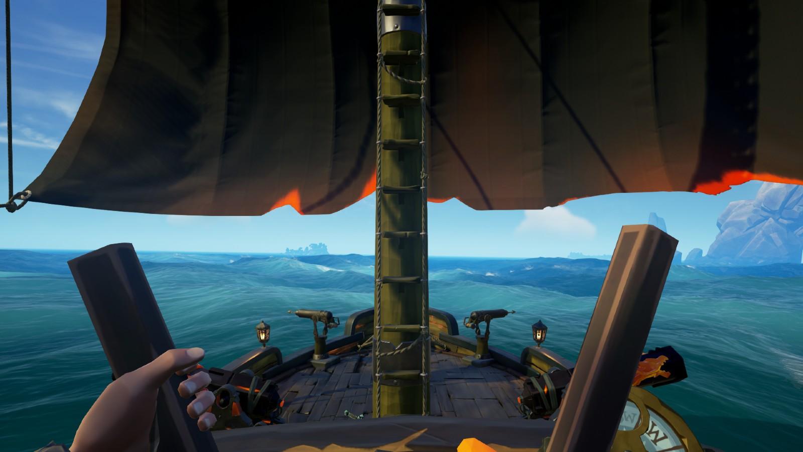 An image of steering a ship in Sea of Thieves.