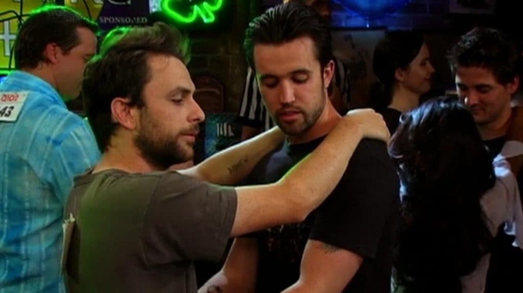 Charlie and Mac dancing together in Always Sunny