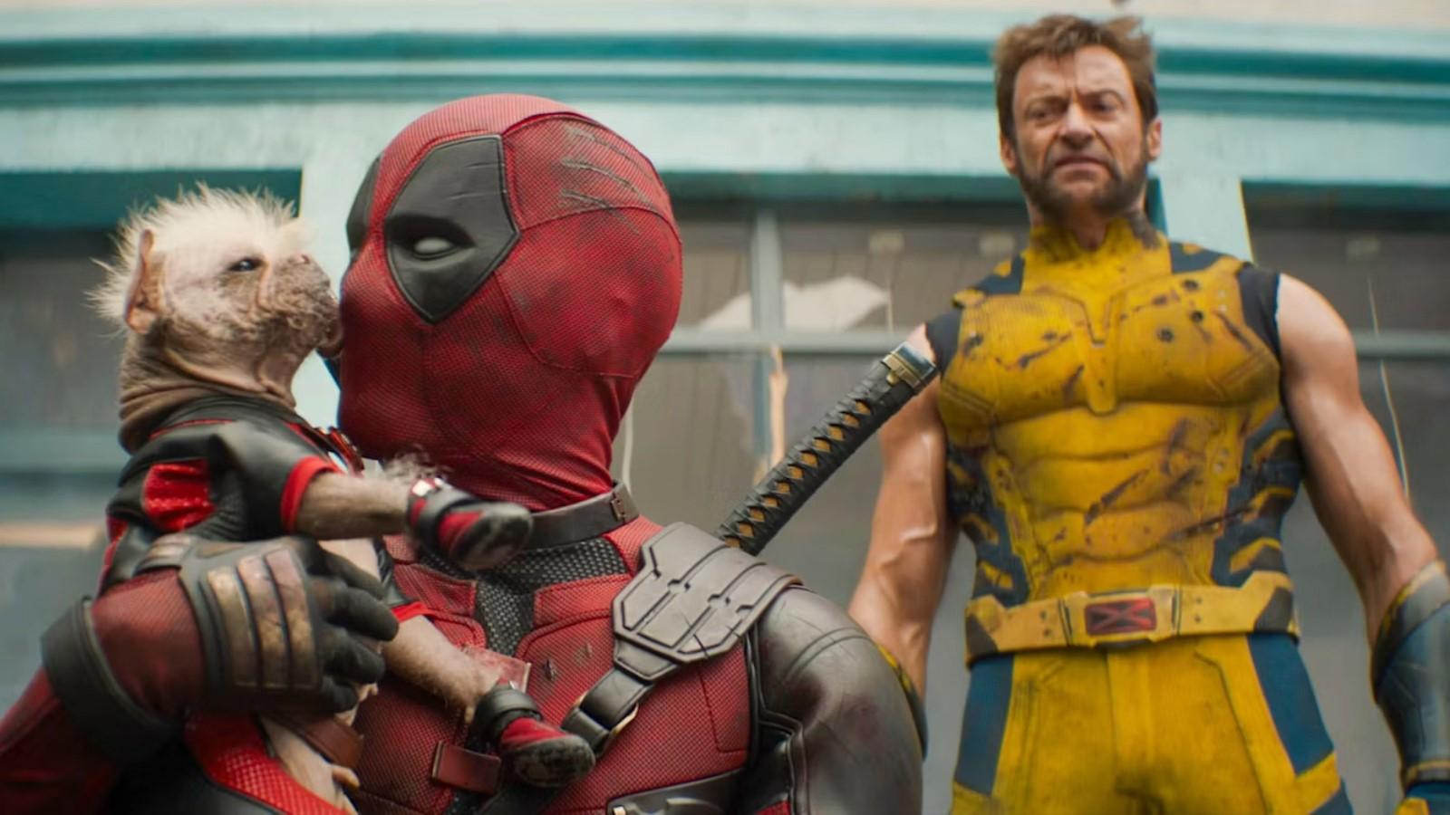 Ryan Reynolds and Hugh Jackman as Deadpool and Wolverine with Deadpool holding a dog that's licking his face