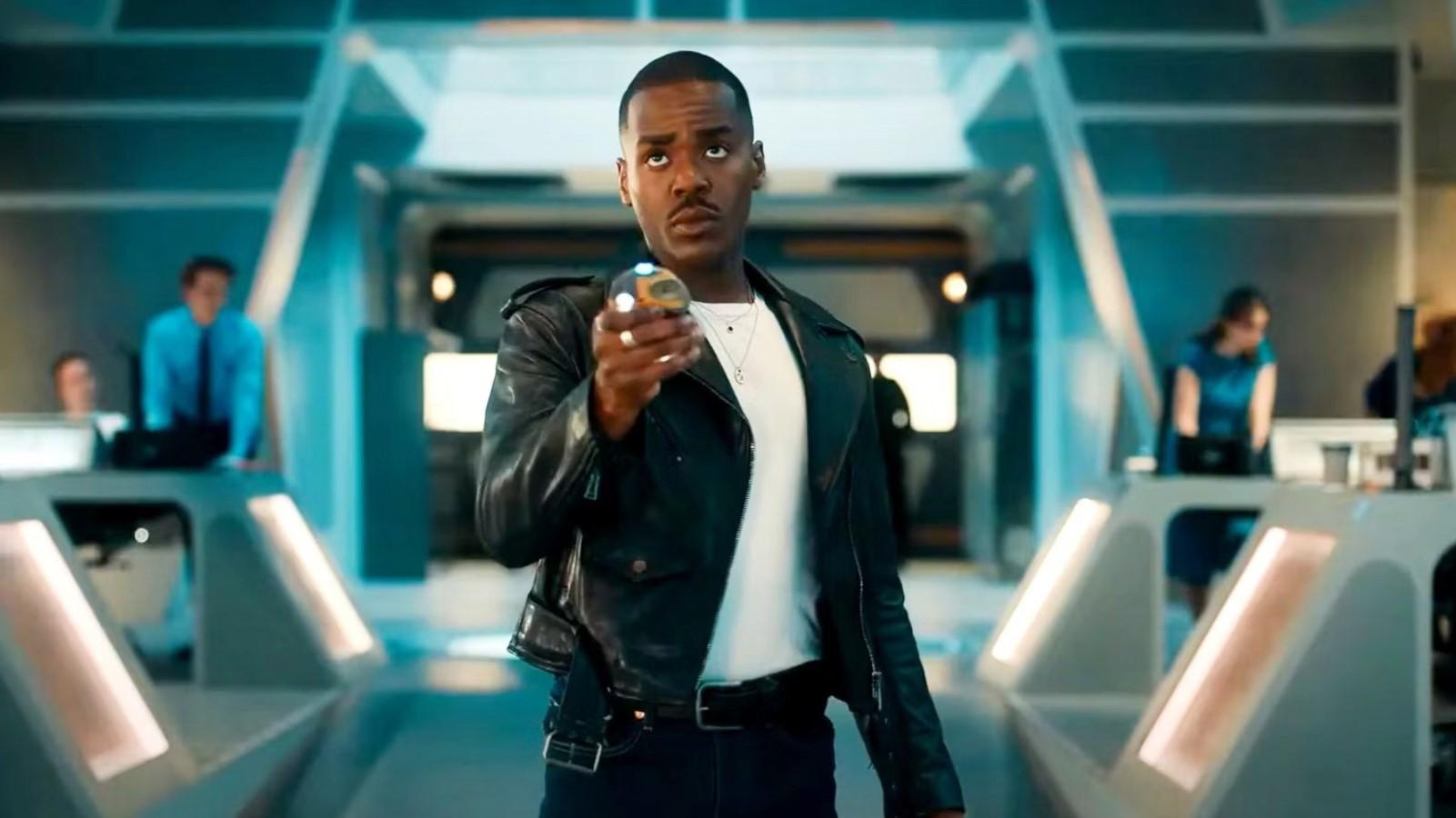 Ncuti Gatwa as the Doctor, holding up his sonic screwdriver