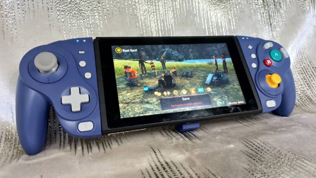 Nyxi Wizard controller attached to Switch in handheld mode