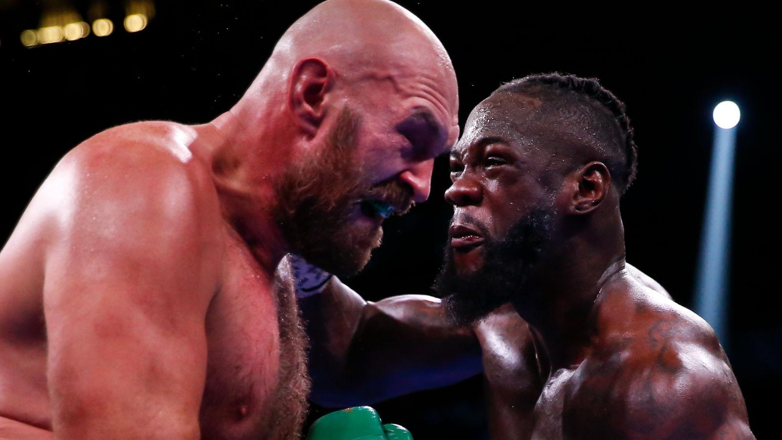 Tyson Fury (L) and Deontay Wilder (R)