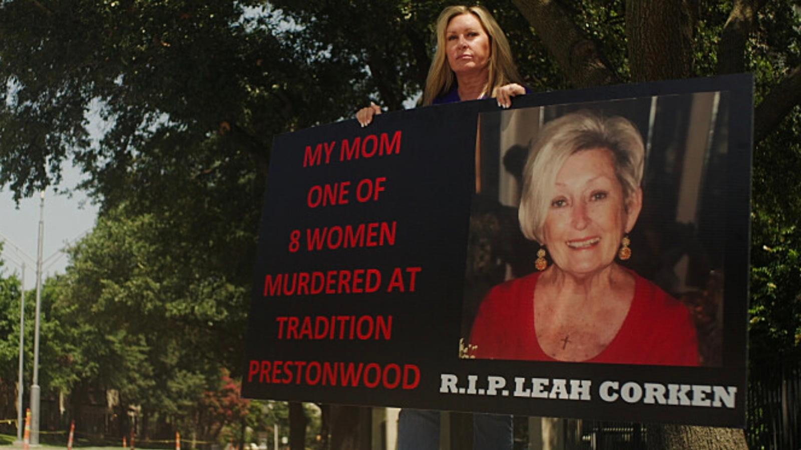 MJ Jennings, daughter of victim Leah Corken, holding a sign outside the Tradition Prestonwood facility in Pillowcase Murders